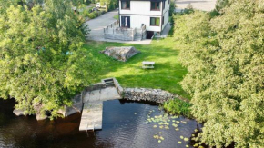 Holiday house by riverside with sauna and hottub Moholm